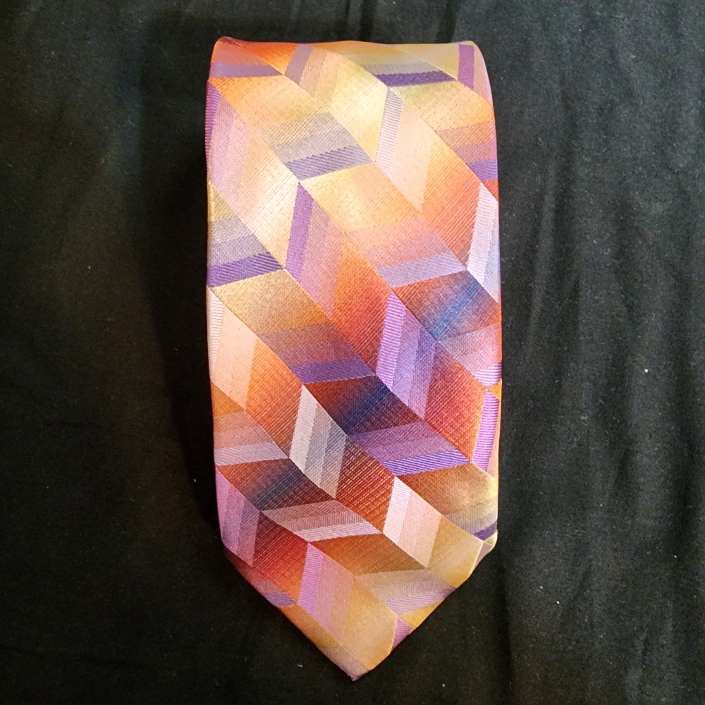 Vintage PIerre Cardin Tie, 100% polyester.  Orange & purple , 60x3.5 in.